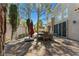 Cozy backyard patio with seating area, ideal for enjoying the outdoors at 8215 Crow Valley Ln, Las Vegas, NV 89113