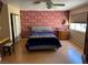 Bedroom with a bed, matching furniture, and a window, creating a comfortable living space at 8225 Bermuda Beach Dr, Las Vegas, NV 89128