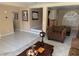 Bright living room showcasing tile flooring, neutral tones, and comfortable seating arrangements at 8225 Bermuda Beach Dr, Las Vegas, NV 89128