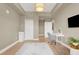 Bedroom with a modern vanity, large closet and office space, lit by contemporary light fixture at 8255 Las Vegas Blvd # 1422, Las Vegas, NV 89123
