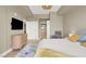 Well-lit bedroom offering a storage cabinet, soft carpet, and closet storage space at 8255 Las Vegas Blvd # 1422, Las Vegas, NV 89123