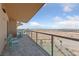 Relaxing balcony with chairs and tables, glass barrier, and city views at 8255 Las Vegas Blvd # 809, Las Vegas, NV 89123