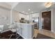 Modern kitchen with white cabinetry, stainless steel appliances, breakfast bar, and modern fixtures at 8255 Las Vegas Blvd # 809, Las Vegas, NV 89123