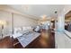 Open-concept living space with hardwood floors, modern decor, and access to the kitchen and dining area at 8255 Las Vegas Blvd # 809, Las Vegas, NV 89123