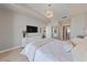 Spacious main bedroom featuring accent lighting, balcony and views to ensuite at 8255 Las Vegas Blvd # 809, Las Vegas, NV 89123