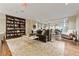 Relaxing sitting area boasts a bookshelf, plush sofa, and decorative rug at 8255 Las Vegas Blvd # 809, Las Vegas, NV 89123