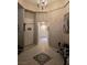 Inviting hallway with tile flooring, neutral walls, and recessed lighting at 8277 Orange Vale Ave, Las Vegas, NV 89131
