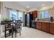 Bright eat-in kitchen with tiled floors and plenty of natural light at 8550 Little Fox St, Las Vegas, NV 89123