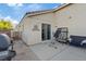 A cozy patio with a grill, bench, and room for relaxation, perfect for outdoor enjoyment at 8550 Little Fox St, Las Vegas, NV 89123