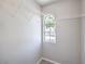 Walk-in closet featuring a window and wire shelving at 8712 Texas Bronco Ave, Las Vegas, NV 89129