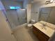 Bright bathroom showcasing a shower and tub combination, a vanity with a sink, and a standard toilet at 9070 Spring Mountain Rd # 109, Las Vegas, NV 89117