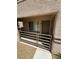 View of the covered entrance showing unit number and metal railing at 9070 Spring Mountain Rd # 109, Las Vegas, NV 89117