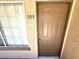 View of the front door of unit 109, showing the access point to the home at 9070 Spring Mountain Rd # 109, Las Vegas, NV 89117