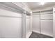 This walk-in closet offers generous storage space with multiple shelves and hanging rods for organization and convenience at 9129 Patrick Henry Ave, Las Vegas, NV 89149