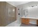 Modern bathroom featuring a glass shower with marble accents, and sleek fixtures at 913 Duckhorn Ct # 201, Las Vegas, NV 89144