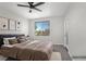 Bedroom with a nightstand and a large window with a view to the exterior at 913 Duckhorn Ct # 201, Las Vegas, NV 89144