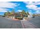 Apartment complex showcasing well-maintained landscaping and convenient parking at 913 Duckhorn Ct # 201, Las Vegas, NV 89144