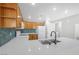 Bright kitchen featuring stainless steel sink, white countertops, and modern cabinets at 913 Duckhorn Ct # 201, Las Vegas, NV 89144