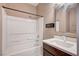Bathroom featuring a shower and tub combination with a dark wood vanity at 9217 Valley Betica Ave, Las Vegas, NV 89148