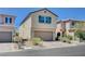 Charming two-story home with an attached two-car garage and well-manicured front yard at 9217 Valley Betica Ave, Las Vegas, NV 89148