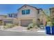Charming two-story home with a well-maintained front yard and attached two-car garage at 9217 Valley Betica Ave, Las Vegas, NV 89148