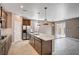 Bright kitchen with granite counters, stainless appliances, and a large island at 9217 Valley Betica Ave, Las Vegas, NV 89148