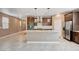 Modern kitchen featuring granite countertops, stainless steel appliances, and ample cabinet space at 9217 Valley Betica Ave, Las Vegas, NV 89148