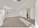 Sunlit upstairs loft features plush carpeting, recessed lighting, and plenty of natural light at 9327 Ettrick Ct, Las Vegas, NV 89178