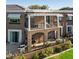 Exterior view of the patio and backyard of a two-story townhome at 9430 Laguna Niguel Dr # 203, Las Vegas, NV 89134