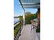 Balcony with outdoor seating overlooking a pond and green space at 9430 Laguna Niguel Dr # 203, Las Vegas, NV 89134