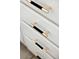 Close up on modern black and gold cabinet pulls against white cabinetry at 9430 Laguna Niguel Dr # 203, Las Vegas, NV 89134