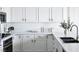 Well-lit kitchen featuring stainless steel appliances, white cabinets, and a modern design at 9430 Laguna Niguel Dr # 203, Las Vegas, NV 89134