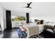Bright main bedroom with a view, featuring a cozy seating area and modern decor at 9430 Laguna Niguel Dr # 203, Las Vegas, NV 89134