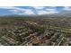 Dramatic aerial view showcasing this community's blend of peaceful living, natural desert beauty, and nearby urban convenience at 9513 Yucca Blossom Dr, Las Vegas, NV 89134