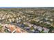 Expansive aerial view of a residential neighborhood, with the Las Vegas skyline visible in the distance at 9513 Yucca Blossom Dr, Las Vegas, NV 89134