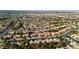 Scenic aerial view showcasing a lovely residential area, complemented by desert landscaping, and lush green spaces at 9513 Yucca Blossom Dr, Las Vegas, NV 89134