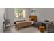 Bright bedroom featuring modern decor, large window, and a cozy, inviting atmosphere at 9513 Yucca Blossom Dr, Las Vegas, NV 89134
