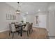 Cozy dining room features a dark wood table set perfect for gatherings at 9513 Yucca Blossom Dr, Las Vegas, NV 89134