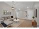 Inviting living room features a comfortable sectional sofa and modern decor at 9513 Yucca Blossom Dr, Las Vegas, NV 89134