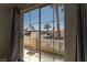 Slider view from the balcony showcasing palm trees and the street at 9604 Summer Cypress St, Las Vegas, NV 89123