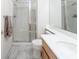 Bathroom featuring tile floors, a glass shower and chrome fixtures at 9604 Summer Cypress St, Las Vegas, NV 89123