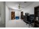 Bedroom with ceiling fan, blinds and bookshelves at 9604 Summer Cypress St, Las Vegas, NV 89123
