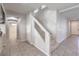 Welcoming entryway with tile flooring, staircase, and neutral paint at 9876 Parador Cellars Ct, Las Vegas, NV 89141