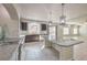 Spacious kitchen with granite countertops, stainless steel appliances, and a large kitchen island at 9876 Parador Cellars Ct, Las Vegas, NV 89141