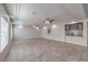 Spacious living room featuring tile floors, recessed lighting, and ceiling fans at 9876 Parador Cellars Ct, Las Vegas, NV 89141