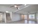 Large living area features tile flooring, recessed lighting, and an open staircase at 9876 Parador Cellars Ct, Las Vegas, NV 89141