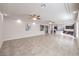 Open living space with tile floors, tray ceilings, and easy access to kitchen at 9876 Parador Cellars Ct, Las Vegas, NV 89141
