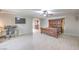 Large main bedroom boasts an ensuite bathroom, tv, and desk at 9876 Parador Cellars Ct, Las Vegas, NV 89141