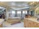 Luxurious bathroom featuring a soaking tub, walk-in shower, and dual vanities at 9905 Fox Springs Dr, Las Vegas, NV 89117