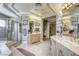 The stylish bathroom offers dual sinks, a walk-in shower, and elegant finishes at 9905 Fox Springs Dr, Las Vegas, NV 89117